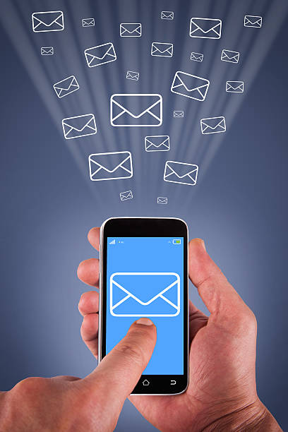 touching smartphone pantalla de correo electrónico - business blurred motion text messaging defocused fotografías e imágenes de stock