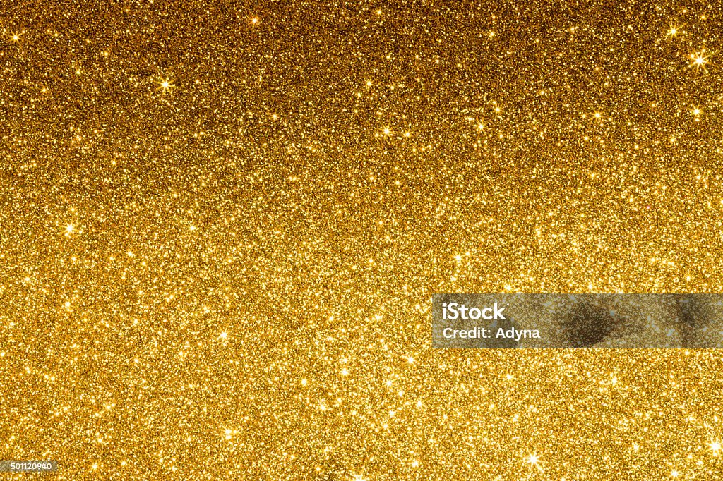 Gold Glitter Background Gold Glitter Background with Star. Gold Colored Stock Photo