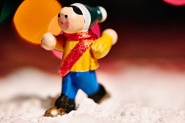 istock Toy decoration running on snow in macro shot 501125332