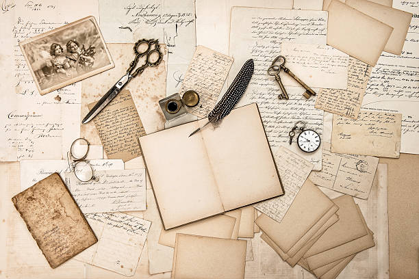 Old handwritten letters, pictures and antique writing accessories Old handwritten letters, pictures and antique writing accessories. Nostalgic sentimental paper background scissors photos stock pictures, royalty-free photos & images