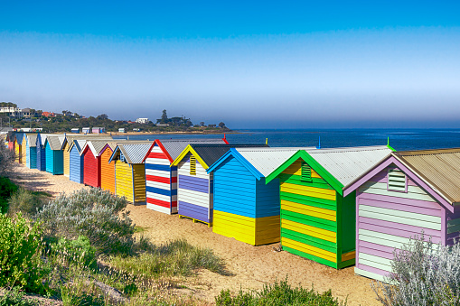 Brighton Beach bathing boxes, Melbourne, Australia.  Overlooking Port Phillip Bay.