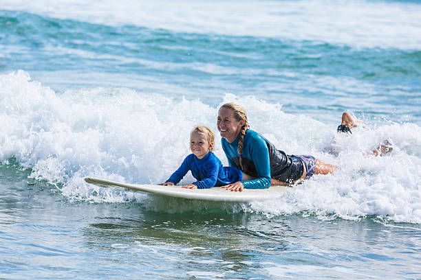 istock Mother and Child Going Surfing at the Beach 501127616