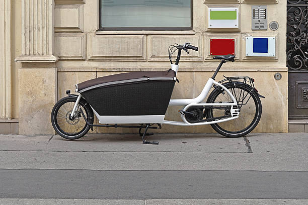 Cargo bicycle Transport bicycle with big cargo box cargo bike photos stock pictures, royalty-free photos & images
