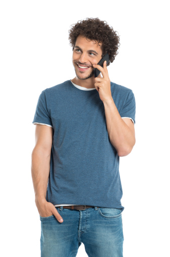 Portrait Of Happy Young Man Talking On Cellphone Isolated On White Background