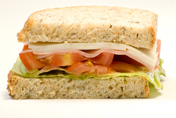 istock Sandwich of cheese, ham, tomato and lettuce 501134317
