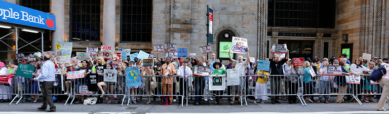New York City - June 30 2014: New Yorkers Against Fracking staged a demonstration in front of the Hyatt Grand Hotel where Governor Cuomo held a fundraiser to urge a statewide ban of fracking, a controversial method of extracting natural gas