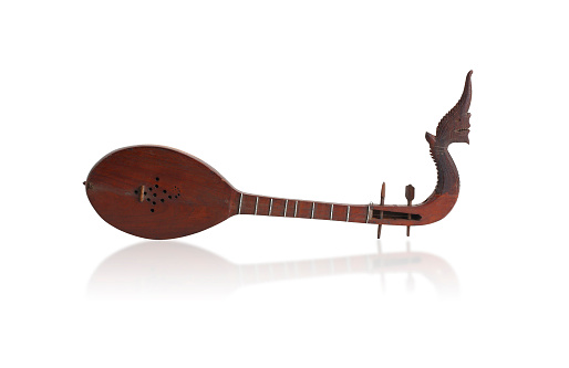 Thai two-stringed lute quitar, the Thai north or northeast region music instrument isolated on white