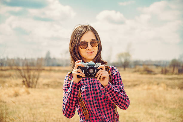 istock Hipster girl with old photo camera 501136457