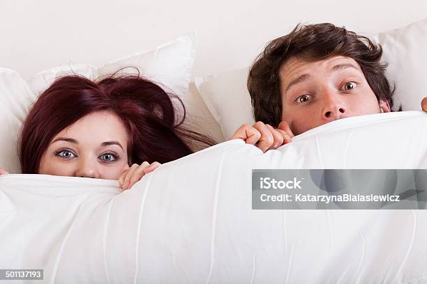 Couple Surprised In Bed Stock Photo - Download Image Now - Adult, Adults Only, Beautiful People