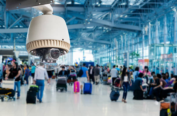 CCTV camera or surveillance operating in air port stock photo