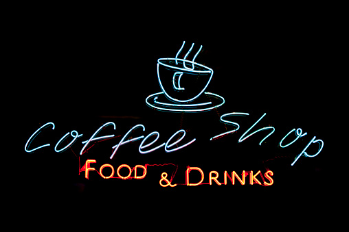 coffee neon light sign , glowing coffee with brick background