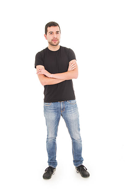 istock young hispanic man posing with crossed arms 501140423