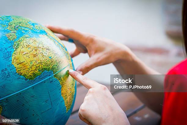 Choosing A Place On Africa On Globe Stock Photo - Download Image Now - Globe - Navigational Equipment, Physical Geography, Cartography