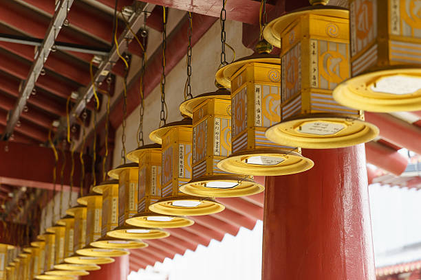 Lanterns in Shitennoji Temple in Osaka, Japan Osaka, Japan - November 26, 2015: Lanterns in Shitennoji Temple which was built by Prince Shotoku between 574 and 622. It is the favorite shrine of Japanese and regarded as the Buddhist changing in Osaka. shitenno ji stock pictures, royalty-free photos & images