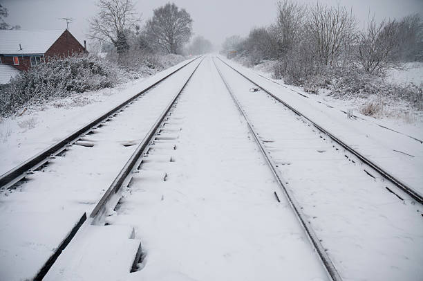 istock Railway Tracks In The Winter Snow 501147296