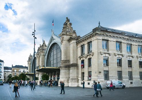 Tours, France- May 27, 2014: Passengers rush to and from the Gare de Tours, the main railroad station in Tours, France.