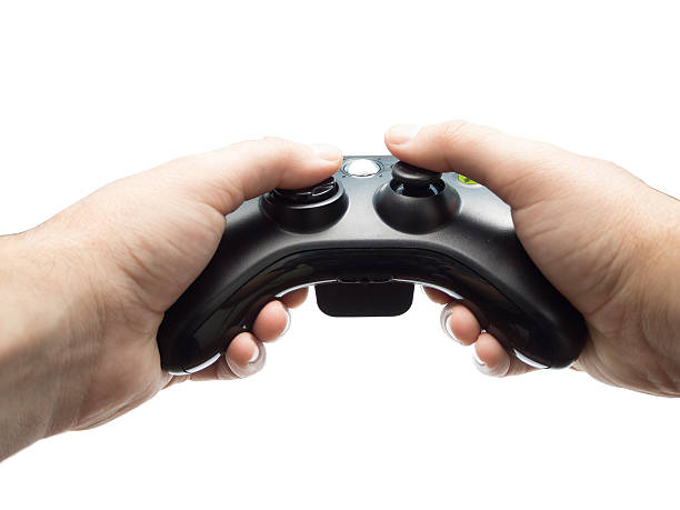 istock Male Hands Holding Gamepad isolated 501150084