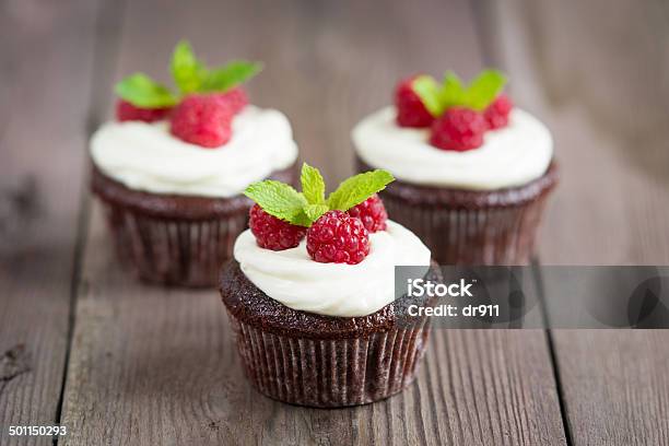 Raspberry Chocolate Cupcakes Stock Photo - Download Image Now - Backgrounds, Baked, Baked Pastry Item