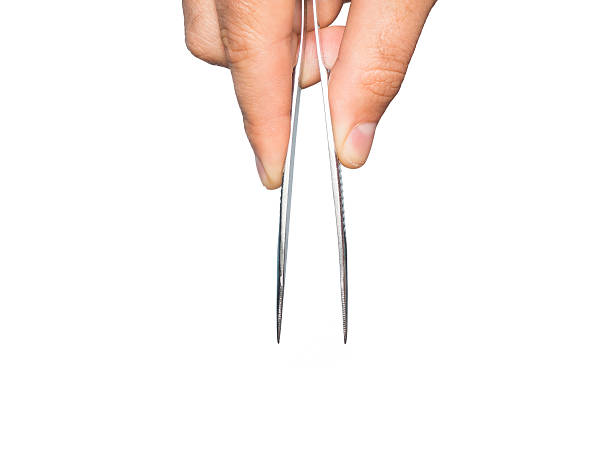 istock Man hand with tweezers 501150358
