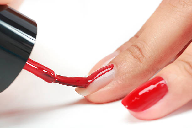 istock red nail polish white background 501151202