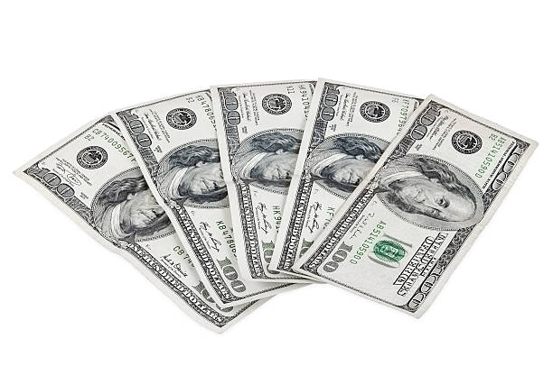 istock Banknotes of 100 dollars on white background 501152423