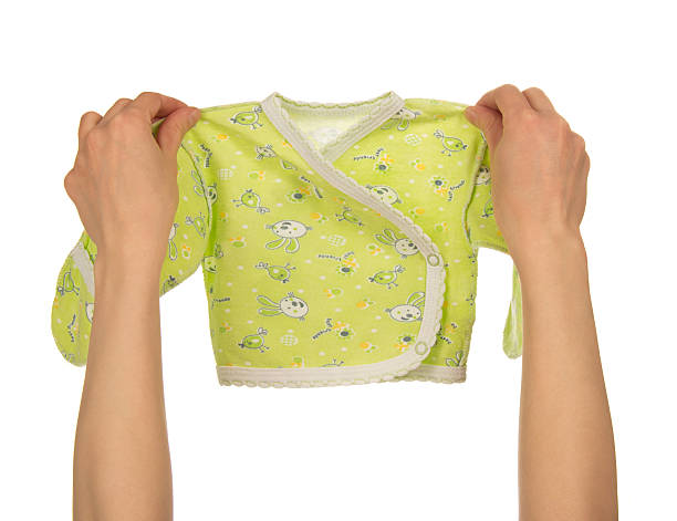 istock Small jacket in the female hands 501152475