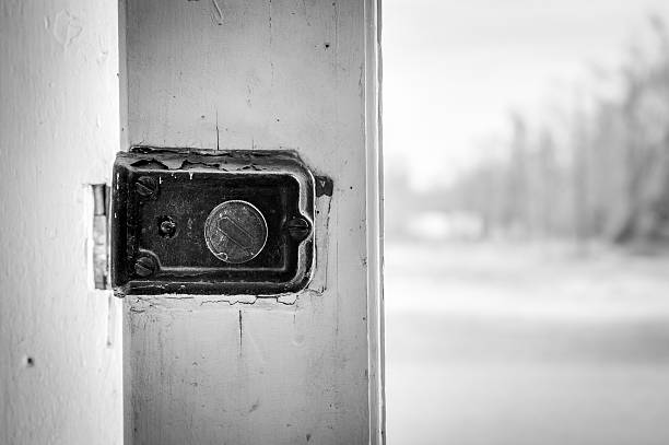 Old Grungy Dead Bolt Lock stock photo