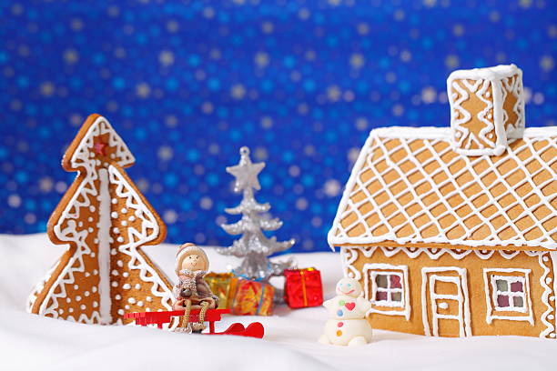 istock Christmas card with gingerbread house and tree 501153542