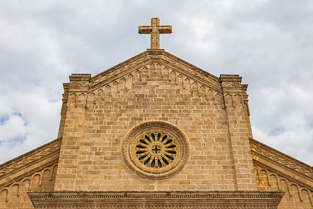 istock Facade and rose window of  Parrocchia Cristo Re, Leuca 501153699
