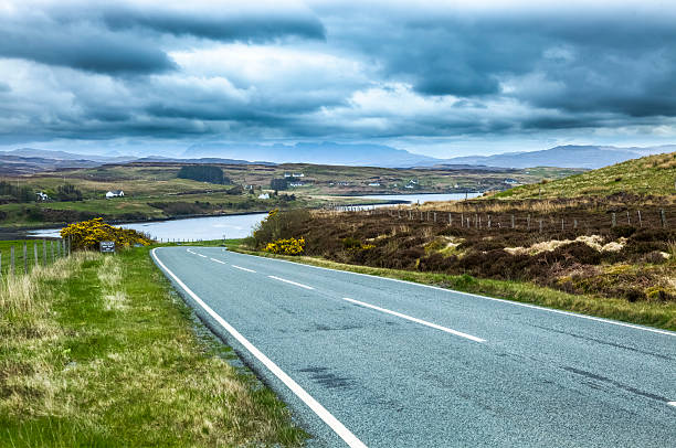 istock Highway and Loch in the Scottish Highlands Under Threatening Clouds 501155661