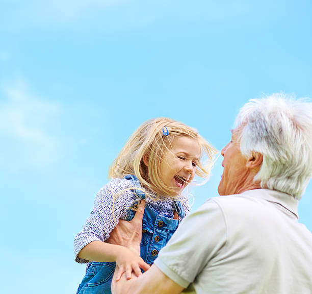 istock Granddad always knows how to make her laugh 501157217