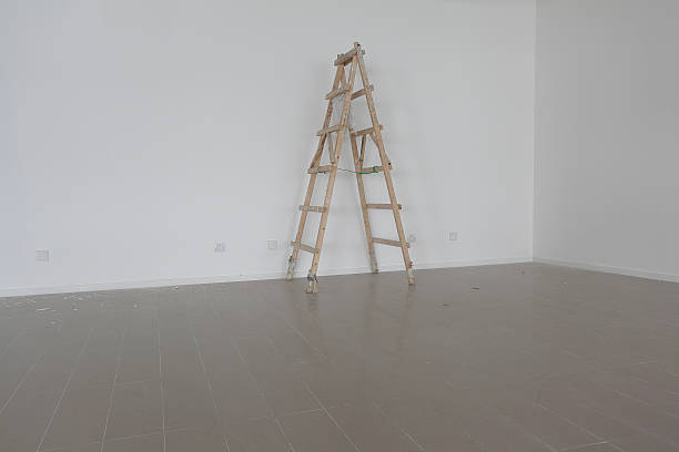 istock new bright empty interior and wooden ladder 501157742