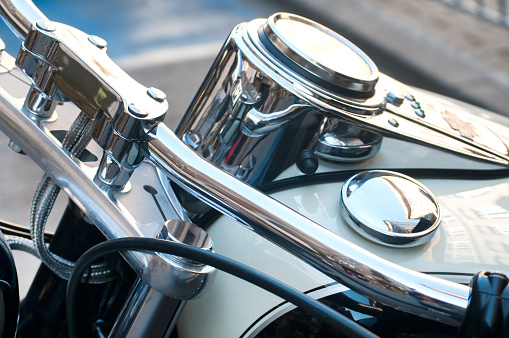 Detail of motorbike handlebar and dashboard closeup