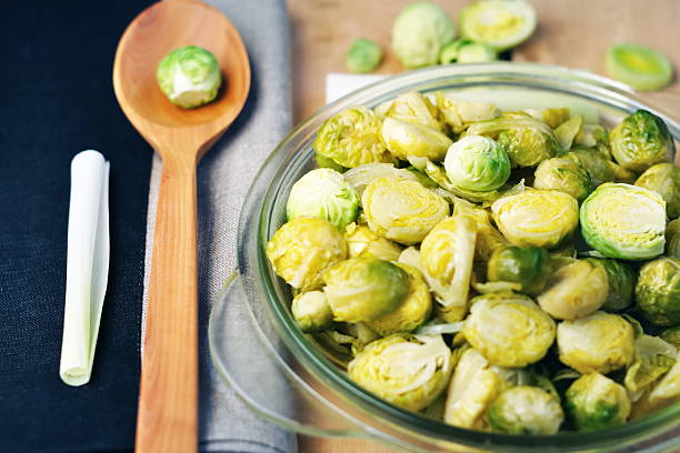 istock Brussels sprouts and leeks stew in the glass plate 501160020