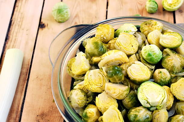 istock Brussels sprouts and leeks stew in the glass plate 501160526