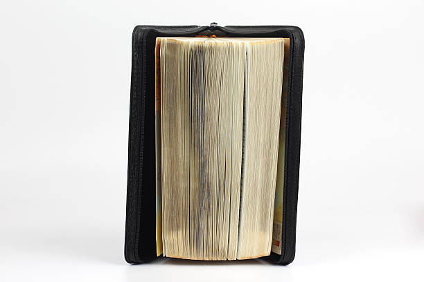 istock Ajar stands the Bible on a white background 501161340