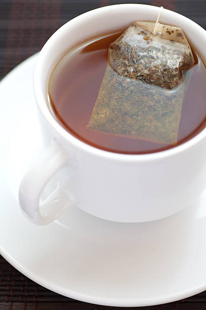 istock Cup of tea with pyramid teabag 501171487