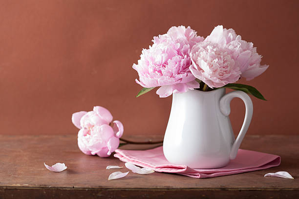 istock beautiful pink peony bouquet in vase 501172703