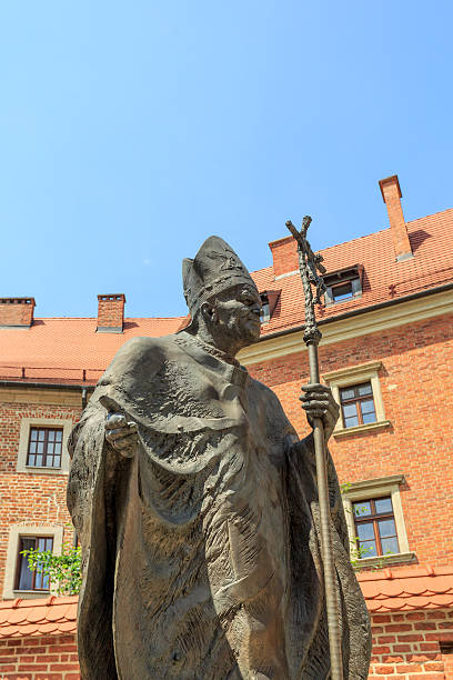 Krakow, Poland- June 26, 2015: Statue of Pope John Paul II (Blessed John Paul II or John Paul the Great, Papa Giovanni Paolo II, Karol Jozef Wojtyla) on Wawel Castle.