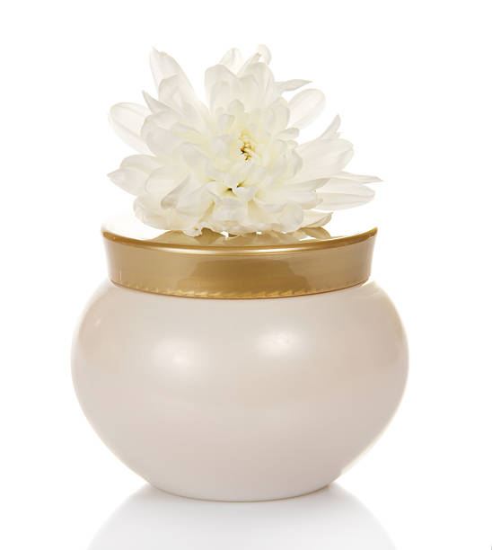 istock Natural cosmetic cream jar and flower 501191517