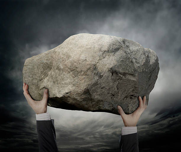 istock Businessman Hold a stone 501191637
