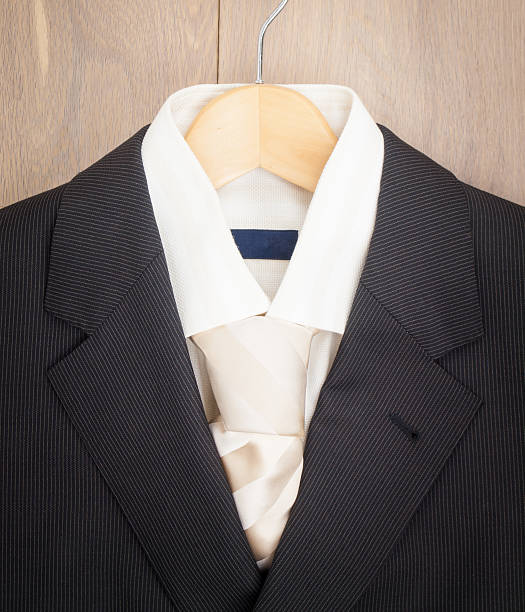 istock mens jacket shirt and tie on a hanger 501193911