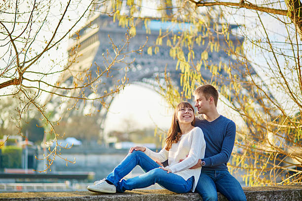 istock Young romantic couple in Paris near the Eiffel tower 501194058