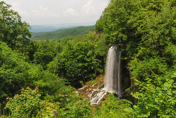 Waterfall and distant mountain range from Scenic Overlook in Allegheny Mountains of Southeastern Virginia.