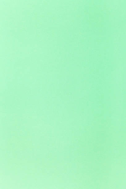 istock light green color toned vertical sheet of paper 501195352