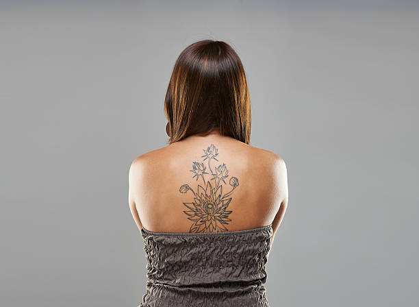 istock Tattoo woman portrait in studio shoot 501195994