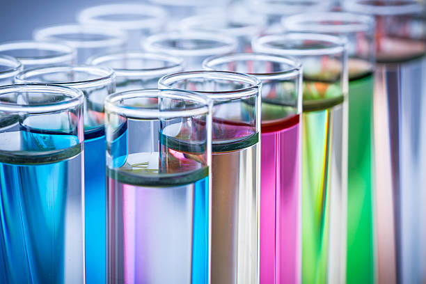 test tubes test tubes with colorful chemicals medical sample photos stock pictures, royalty-free photos & images