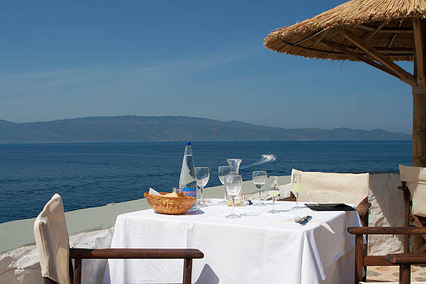 istock Table with glassware at outdoor restaurant 501197443