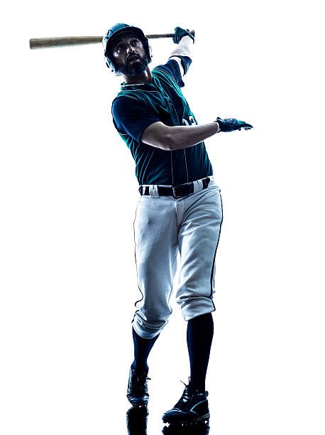 man baseball player silhouette isolated one caucasian man baseball player playing  in studio  silhouette isolated on white background batsman photos stock pictures, royalty-free photos & images