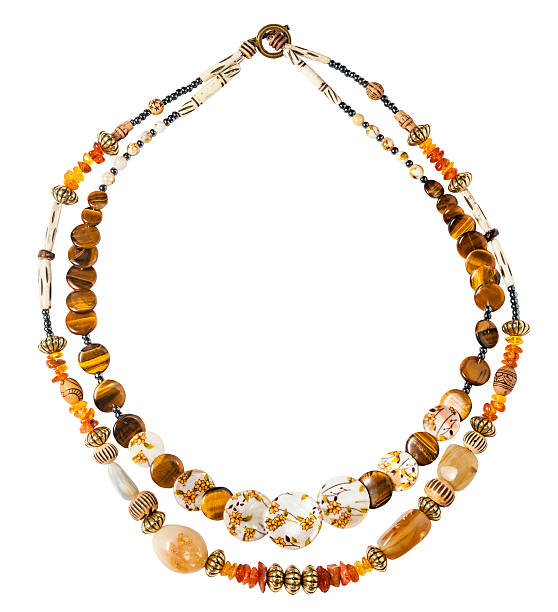 円形のネックレスで琥珀色、タイガース目のビーズ - animal bone stone necklace bead ストックフォトと画像